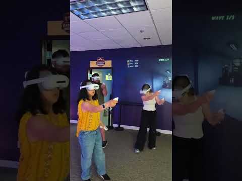 Adult guests playing virtual reality together