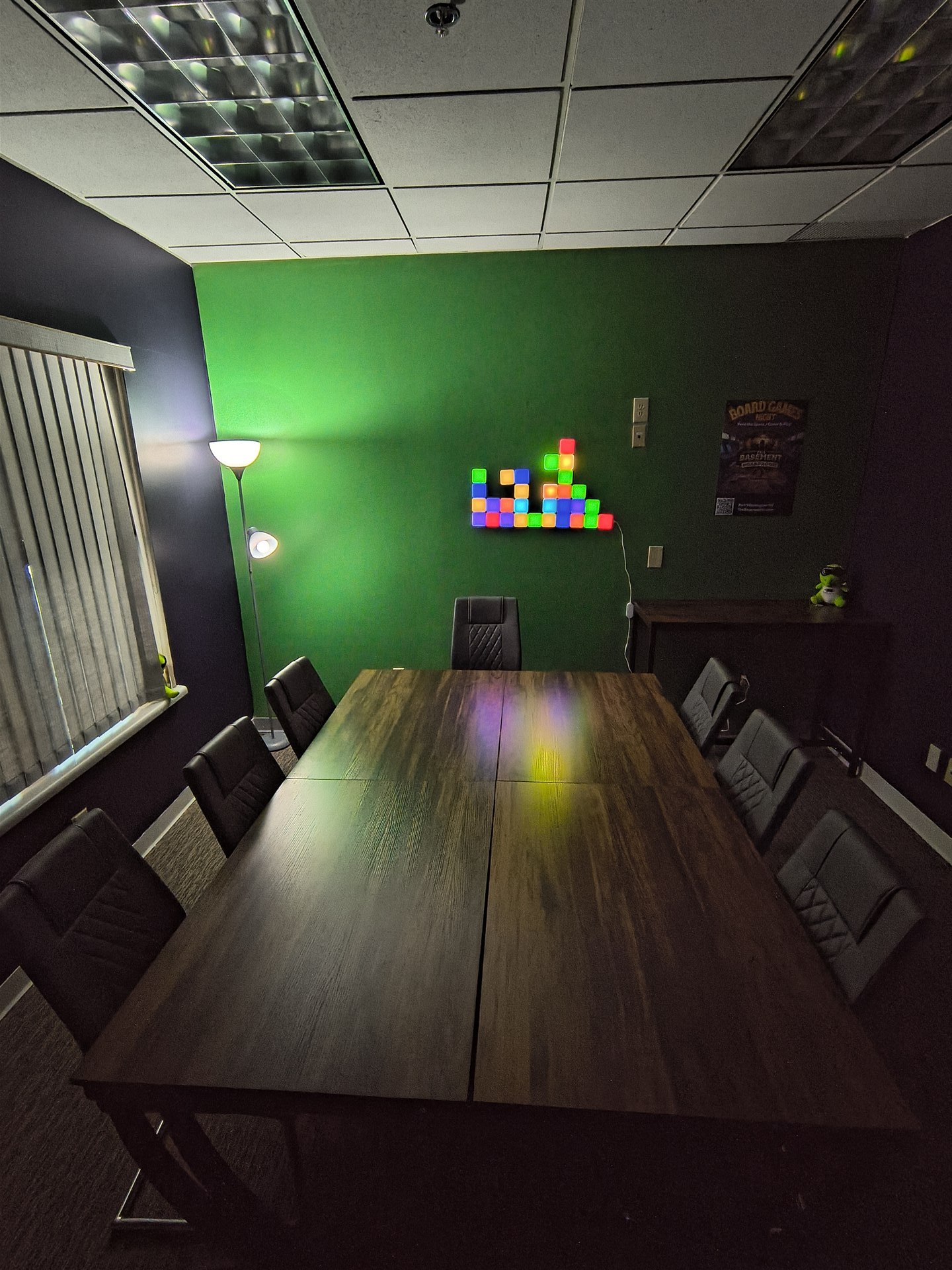 The Basement VR party room arranged with tables and chairs